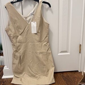 Lucy Paris Beige Textured V‑Neck Sheath Dress